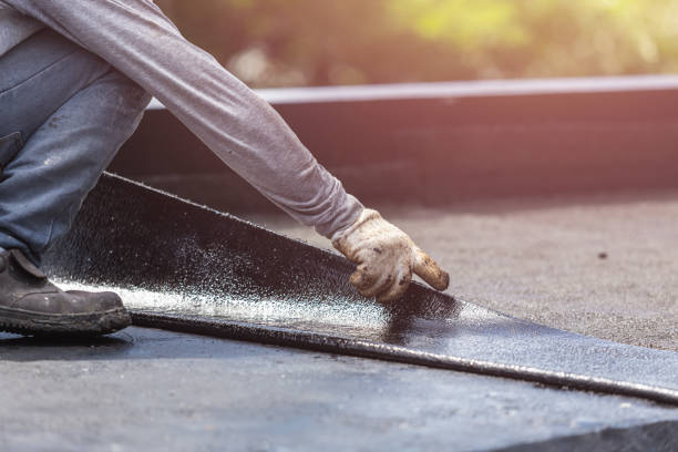 Professional Waterproofing technician working in Caledonia, OH